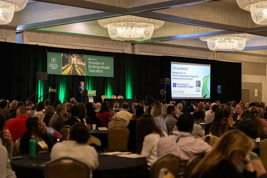 A ballroom full of people attending the 2024 NetVUE Conference.