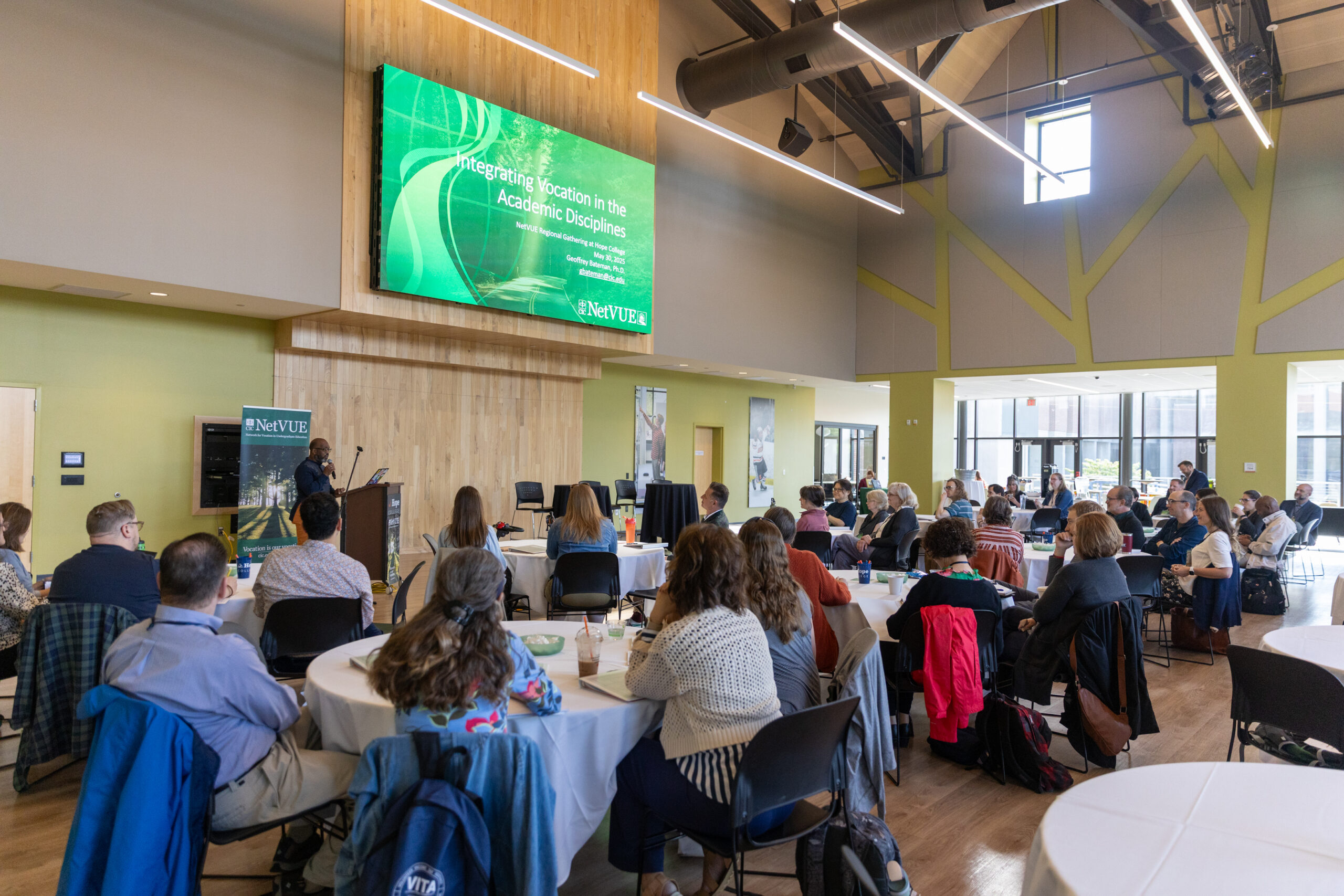 Attendants of the 2025 NetVUE Hope College regional gathering listening to a speaker.