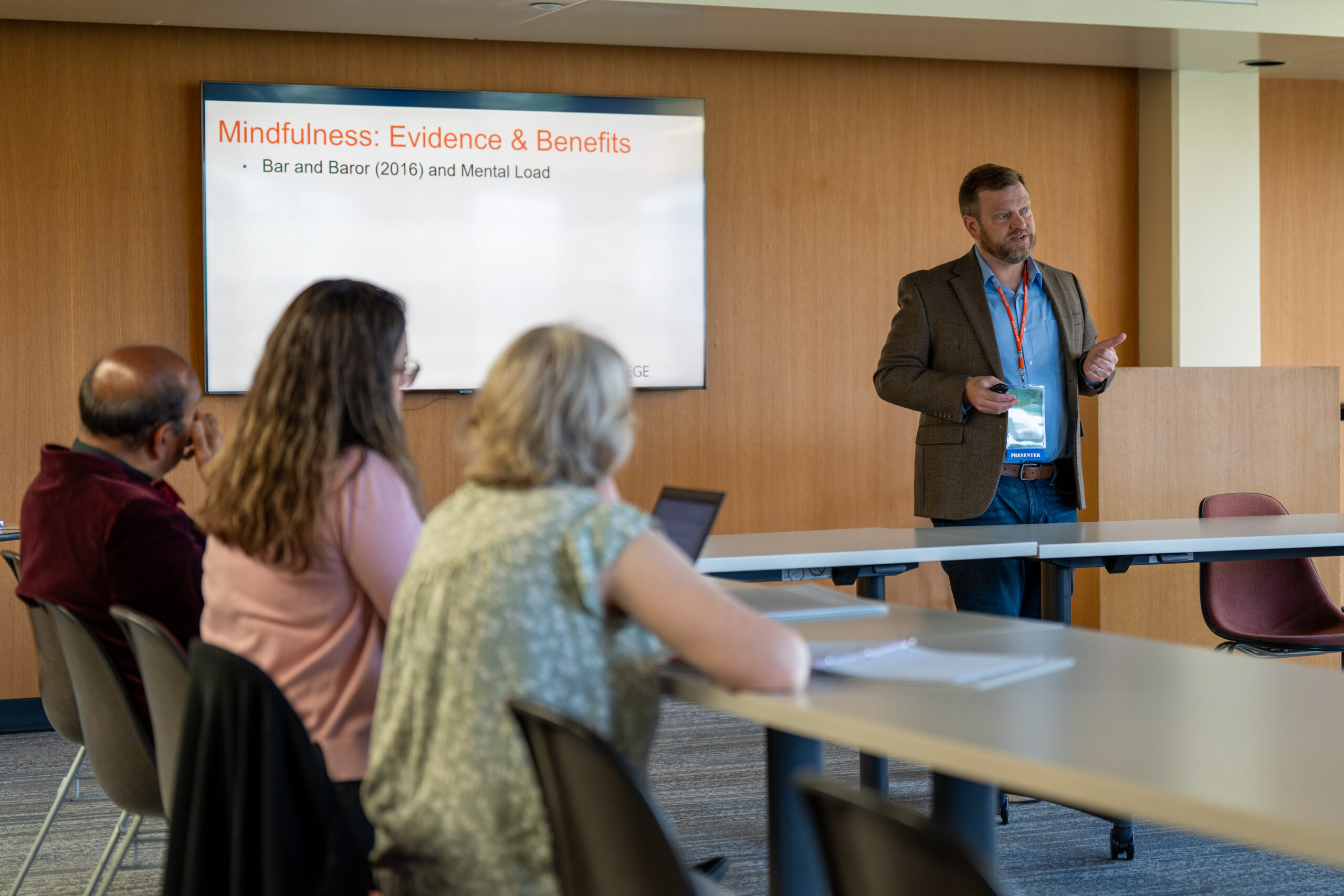 A presenter speaks during a breakout session at the 2025 NetVUE regional gathering at Hope College.