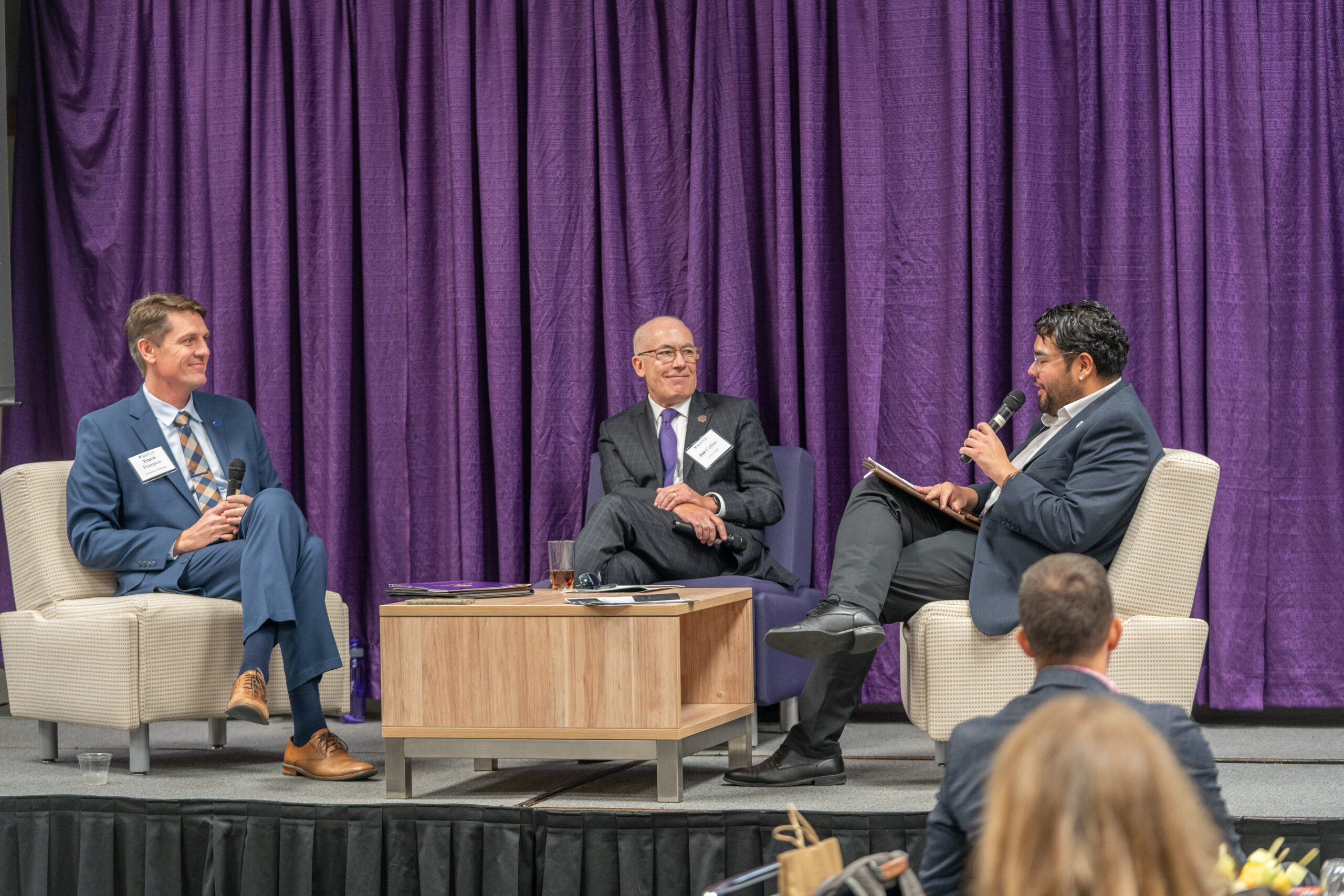 Panelists Jim Collins and Travis Frampton, moderated by Sergio Pérez, speak to participants of the 2024 NetVUE 